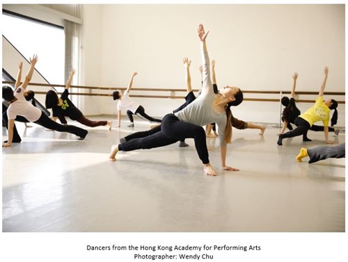 A group of dancers stretching