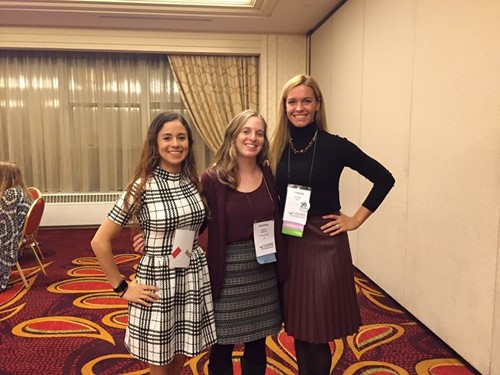 Three students at the meeting